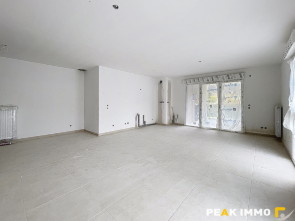Appartement T4 R+1 de 86 m2 Centre de Doussard
