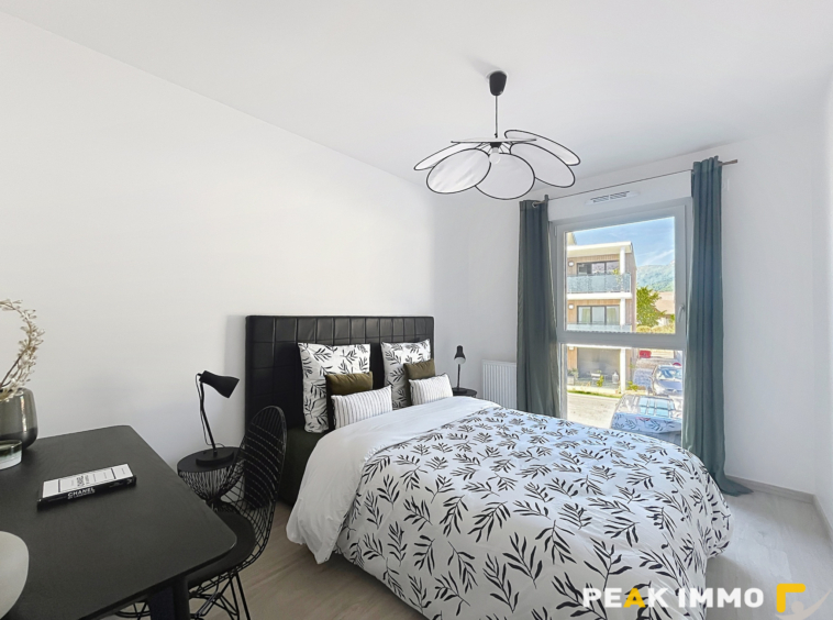 Appartement T4 R+1 de 86 m2 Centre de Doussard