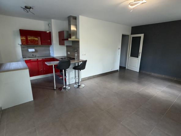 Rez de jardin avec garage et parking