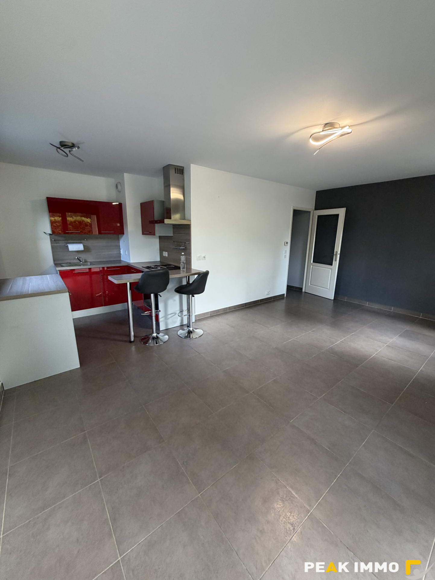 Rez de jardin avec garage et parking